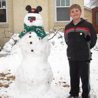 Hayden and his snowman.
